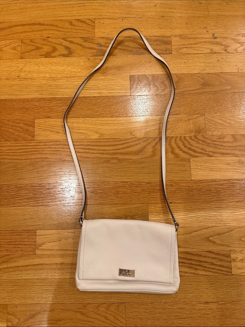 kate spade Cream Pebbled Leather Crossbody Bag with Gold Plaque